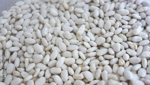 dried beans in water soaked to be cooked in a bowl, boiled beans,