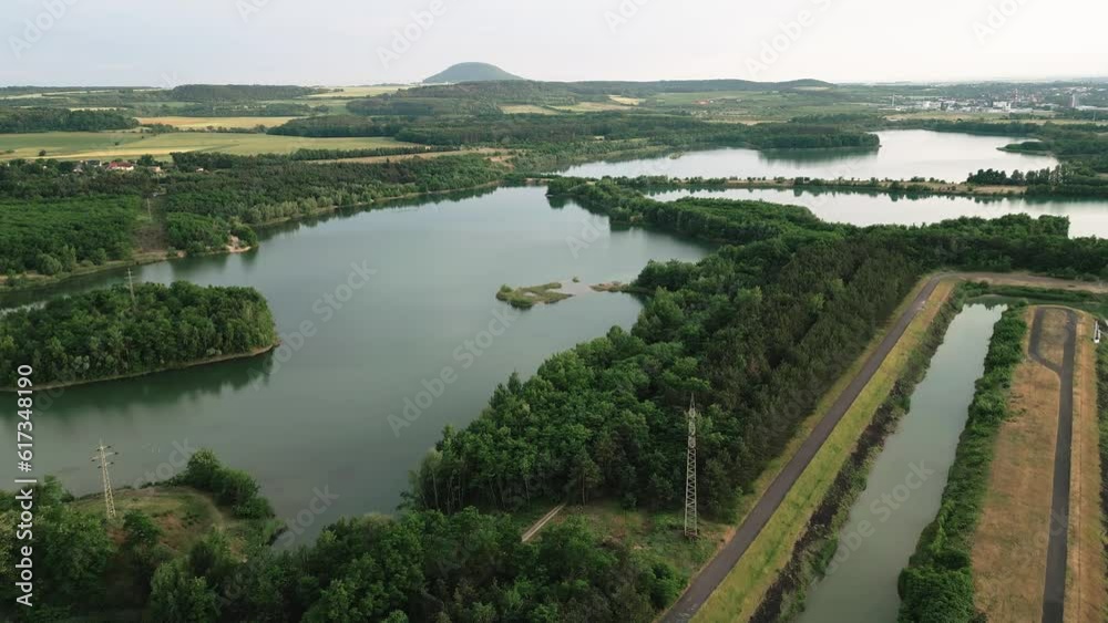 Flying over an artificial canal and natural lakes. Aerial view. Flying over an artificial canal and natural lakes. Aerial view.