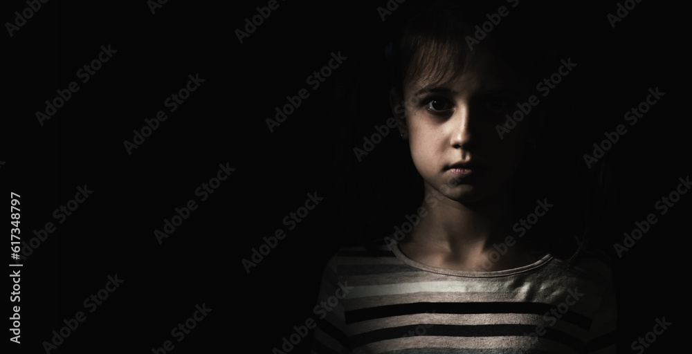 Obraz premium Conceptual image: psychological injuries, children's anxieties and fears, lost childhood. Sad unhappy little child girl feel lonely abandoned, children drama. Copy space for text or design.