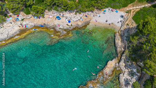 Aerial view of  Famous Cyclone beach near Pula. Rocks in clear water. Istria. Croatia