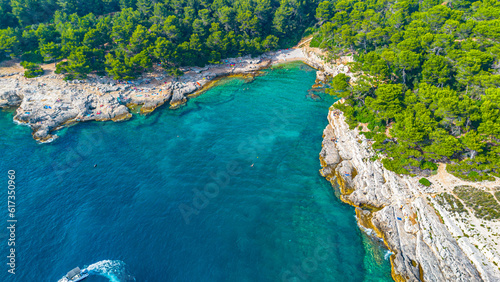 Aerial view of Famous Cyclone beach near Pula. Rocks in clear water. Istria. Croatia