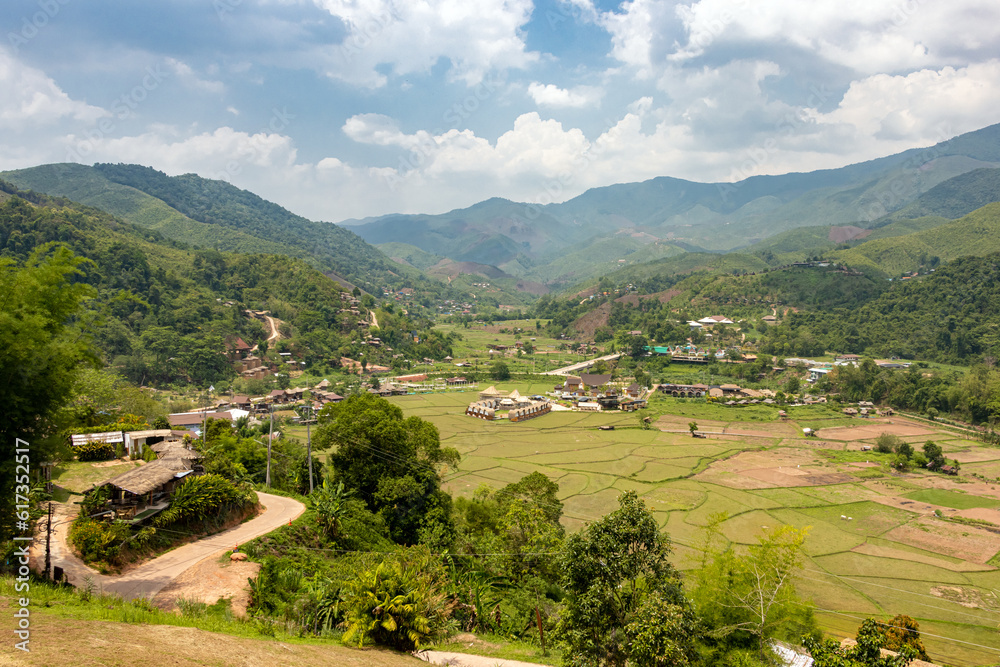 A view of a valley with small rice fields in Nan Province, Northern Thailand