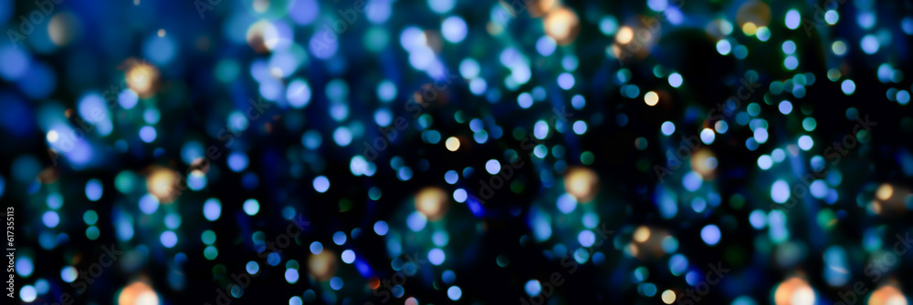 Abstract blue Christmas bokeh light background -Festive glowing New Year header