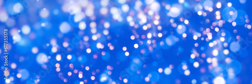Abstract blue Christmas bokeh light background -Festive glowing New Year header