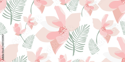 Seamless vector pattern of magnolia flowers and tropical leaves. Ideal for printing on fabric and paper. For panoramas and prints. photo