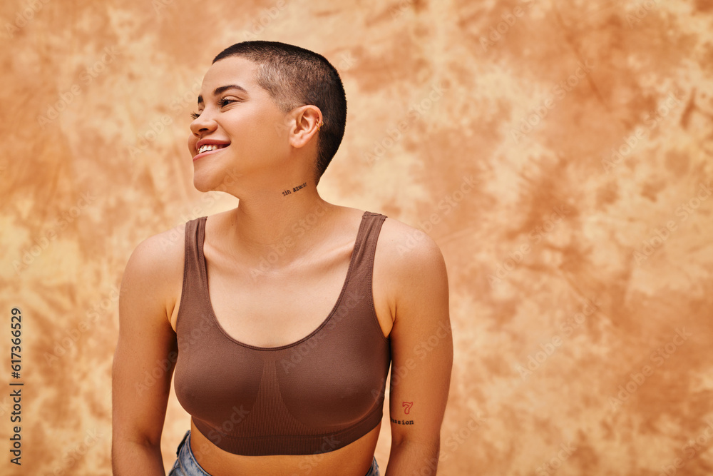body acceptance, curvy and tattooed woman in casual attire standing on mottled beige background, confidence, self-esteem, generation z, body diversity, pretty and joyful body acceptance, curvy and tattooed woman in casual attire standing on mottled beige background, confidence, self-esteem, generation z, body diversity, pretty and joyful