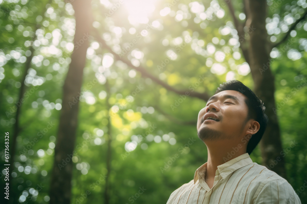 Happy young man breathing deep with a green forest in the background. AI Generative Happy young man breathing deep with a green forest in the background. AI Generative