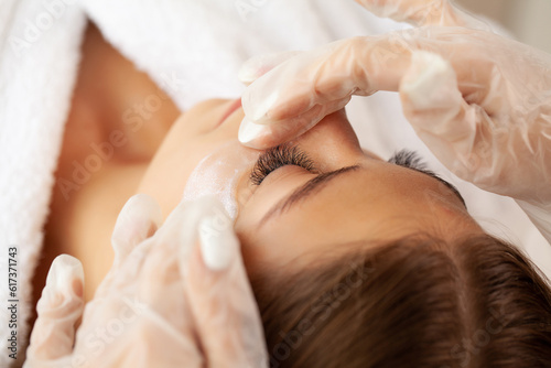 Woman getting spa massage treatment at beauty spa salon