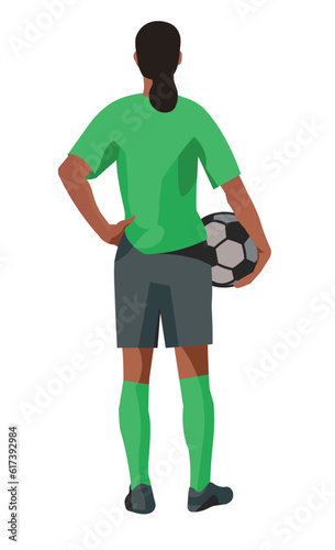 Nigerian women's football girl player stands with her back and holds a ball in hand