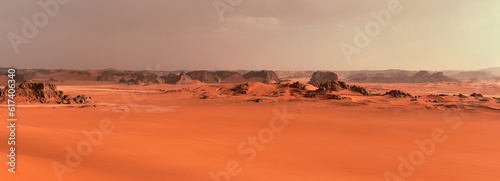 Sand dunes and rocks in the Sahara Desert, Algerian part in the Tadrart and Tassili n'Ajjer mountains, Africa