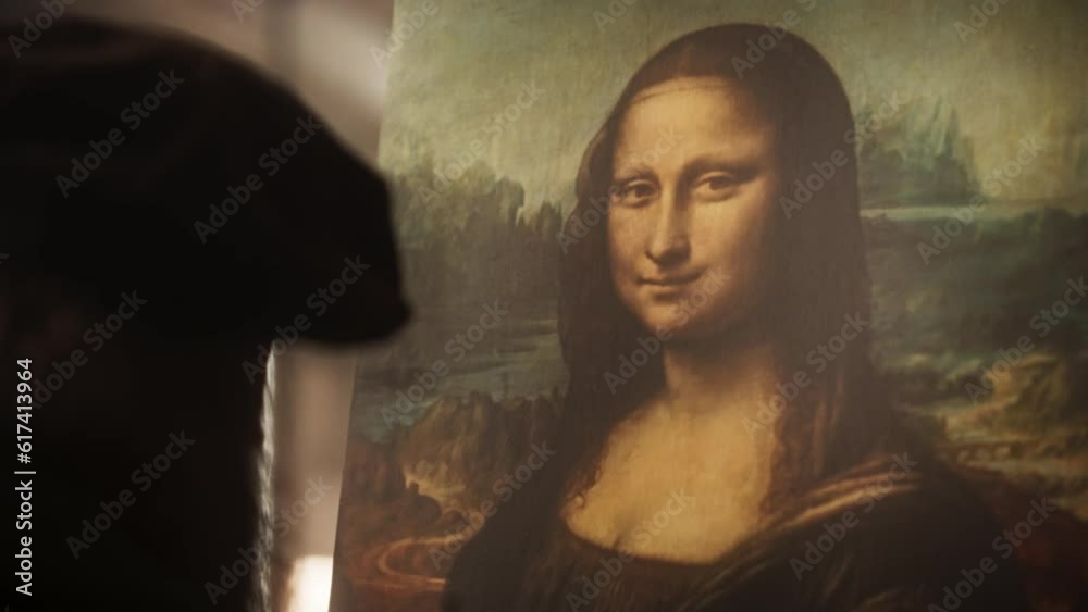 Close Up on The Painting of the Mona Lisa Being Created by Leonardo da Vinci in his Workshop. Renaissance Era Historical Figure and Painter Gently Adding Details to his Masterpiece on the Canvas