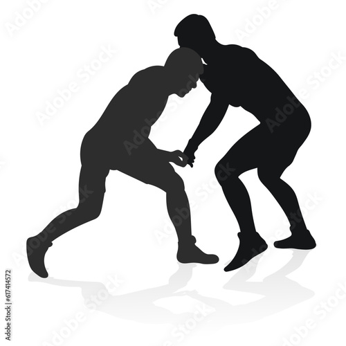 Image of a silhouette of a wrestler athlete in a fighting pose. Greco Roman wrestling, combating, duel, fight, martial art, sportsmanship