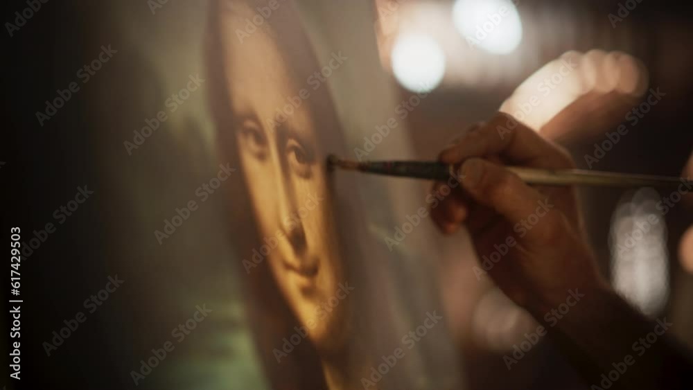 Close Up on Male Painter Hand Painting the Mona Lisa with Gentle Brush Movement. Details of the Famous Painting Being Drawn by its Creator. Pure Talent and Mastery of High Art, Everlasting Beauty