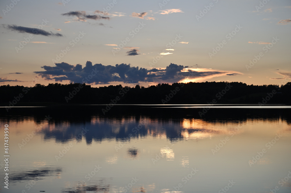 Fototapeta premium Summer sunset over a lake