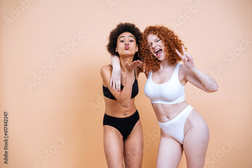 beauty image with two young women with different skin and body