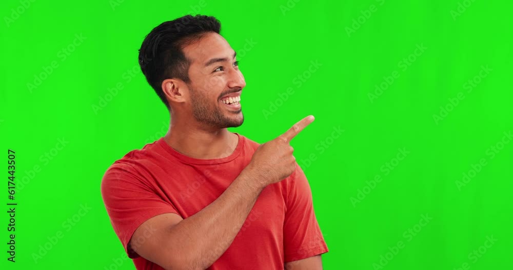 Green screen, presentation and man pointing to marketing space and announcement or information, Yes, offer and happy face of asian person show mockup, creative design or guide on studio background Green screen, presentation and man pointing to marketing space and announcement or information, Yes, offer and happy face of asian person show mockup, creative design or guide on studio background