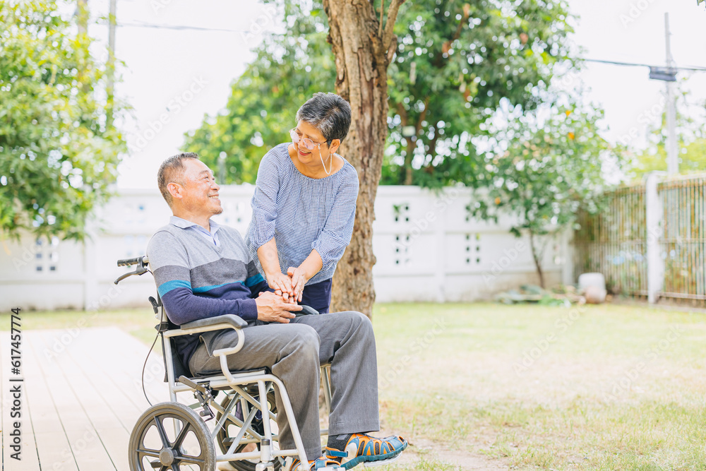 elderly people couple family care love together man sitting on wheelchair, senior pensioner wife happy with disability husband elderly people couple family care love together man sitting on wheelchair, senior pensioner wife happy with disability husband