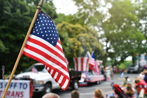 Waving an American flag at the Independence Day Parade on the 4th of July