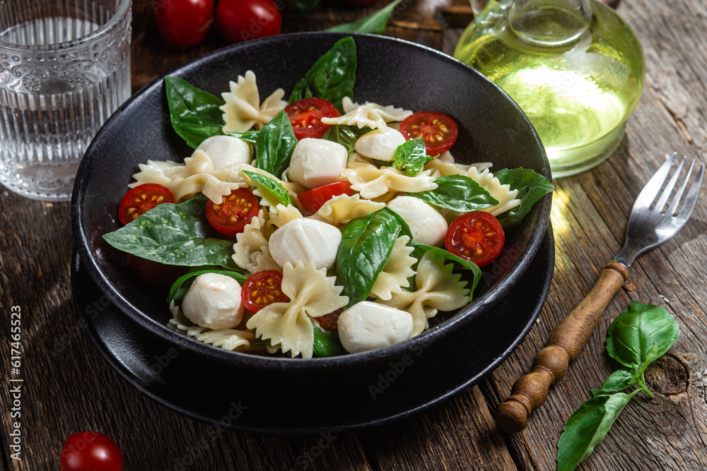 Pasta with tomato, mozzarella and basil Pasta with tomato, mozzarella and basil