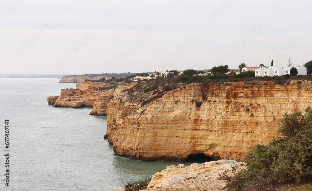 Cliff along the Atlantic Ocean on the Seven Hanging Valleys Trail in southern Portugal on a winter day. Cliff along the Atlantic Ocean on the Seven Hanging Valleys Trail in southern Portugal on a winter day.