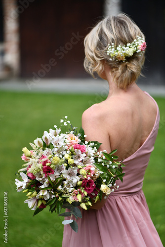 Young girl with a bouquet of flowers