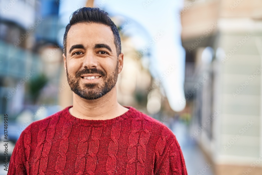 Young hispanic man smiling confident standing at street Young hispanic man smiling confident standing at street