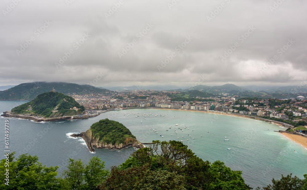 Overview of the Bay of la Concha in San Sebastian, Spain. Cloudscape view HDR image