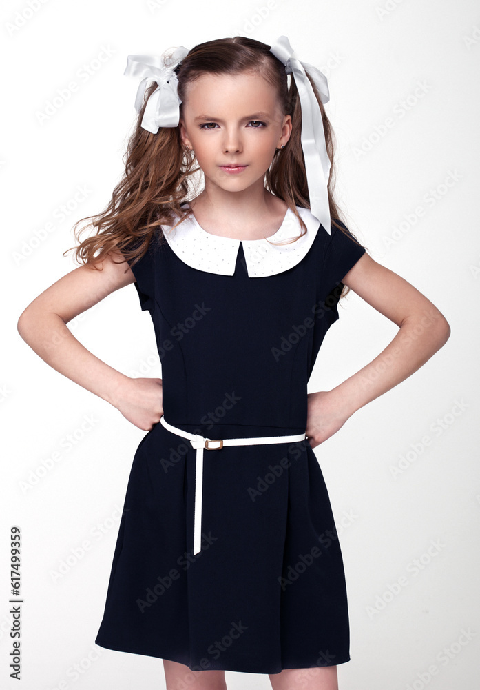 Beautiful cute little school girl emotion on white background Beautiful cute little school girl emotion on white background