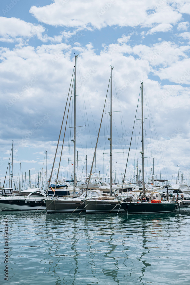 Alicante, Spain - May 16, 2023: Summer Costa Blanca, Alicante  - modern yachts, boats  moored in the city marina. Trip concept. popular Spanish city.  part of the city center