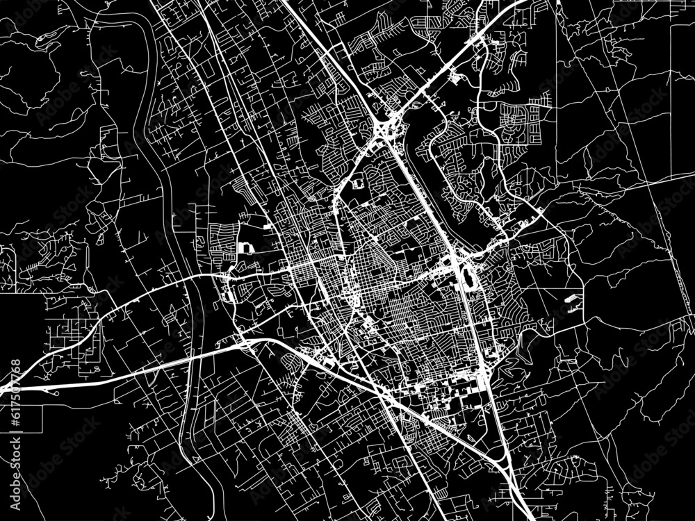 Vector road map of the city of  Las Cruces New Mexico in the United States of America with white roads on a black background.