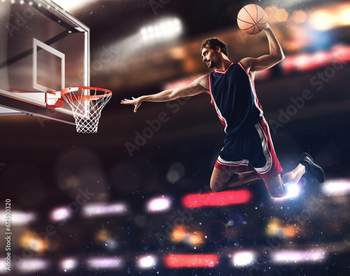 Player throws the ball in the basket in the stadium full of spectators © Designpics