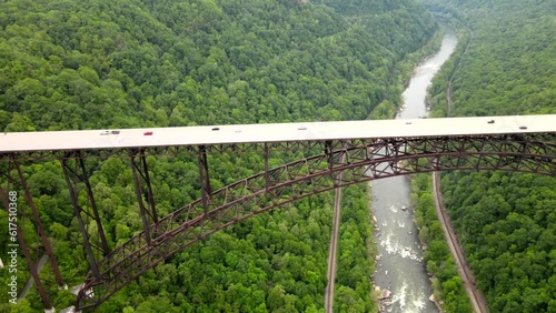 bridge over a gorge and river in New River Gorge National Park and Preserve in West Virginia. Taken from a bird's eye view. photo