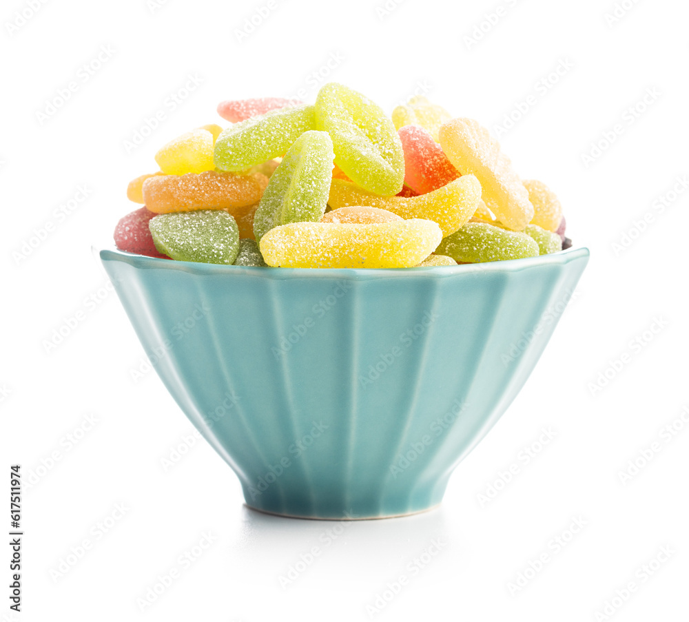 Mix of fruity jelly candy in bowl isolated on white background. Mix of fruity jelly candy in bowl isolated on white background.