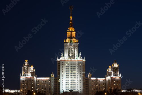Night city lights. Main building of the Lomonosov Moscow State University - MSU. It is one of the Seven Sisters - a group of seven skyscrapers in Moscow designed in the Stalinist style.