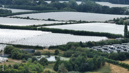 Aerial view of farming polytunnel in the countryside photo