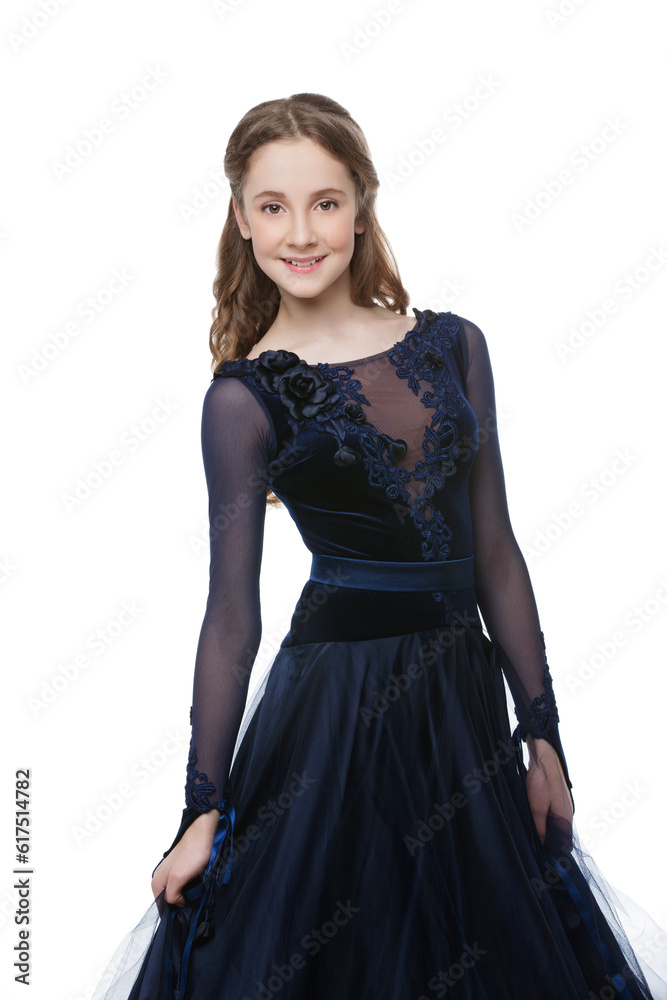 Beautiful teenager ballroom dancer with long blond hair in long dark blue dress. Isolated on white background. Copy space. Beautiful teenager ballroom dancer with long blond hair in long dark blue dress. Isolated on white background. Copy space.