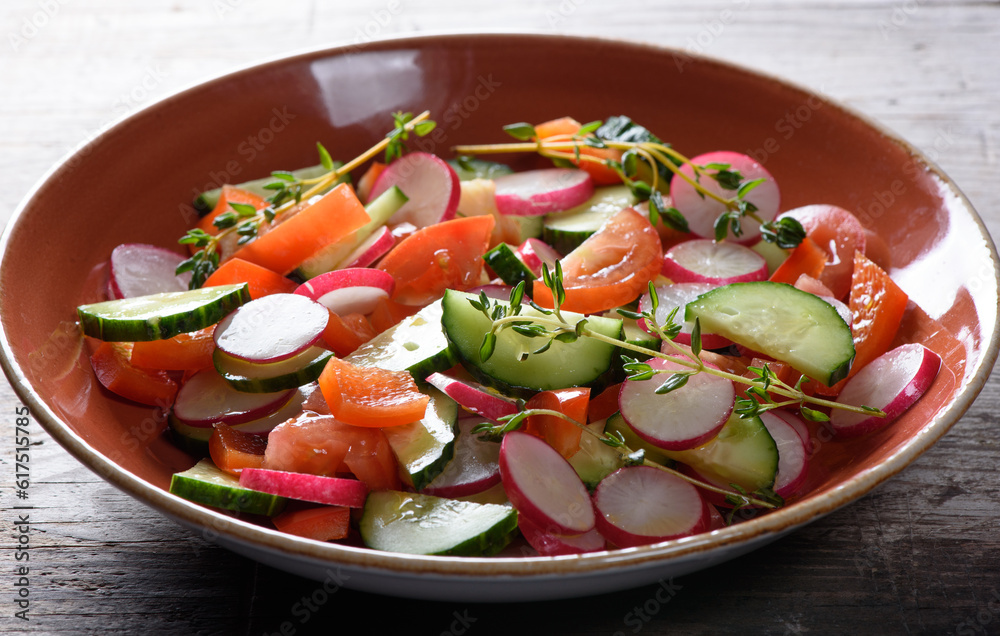 Delicious spring salad with radishes on a plate Delicious spring salad with radishes on a plate