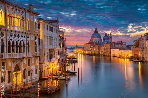 Cityscape image of Grand Canal in Venice, with Santa Maria della Salute Basilica in the background. © Designpics
