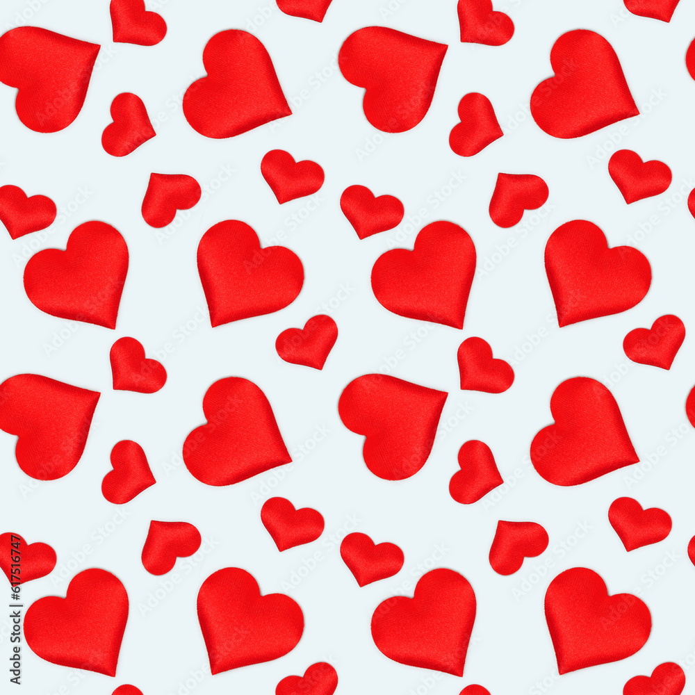 Seamless pattern made of red hearts. Creative concept on a blue background. Seamless pattern made of red hearts. Creative concept on a blue background.