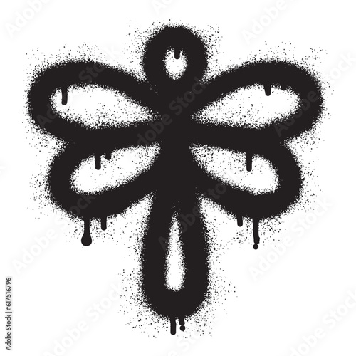 Dragonfly icon graffiti with black spray paint