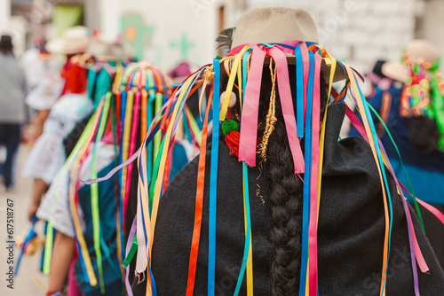 Ceremonia andina Warmi Punlla, donde mujeres indígenas del norte de los andes ecuatorianos bailan en agradecimiento al sol y la pachamama por las cosechas del mes de junio. photo