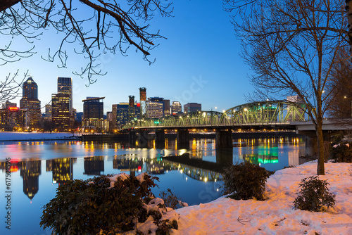 Portland Oregon downtown snow on the banks of Willamette River winter night scene