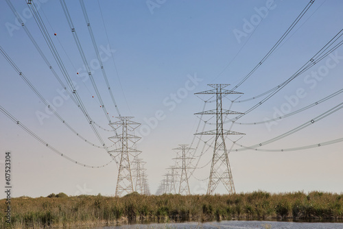 High Power Electric transmission grid lines in the desert.Dammam -Saudi Arabia.