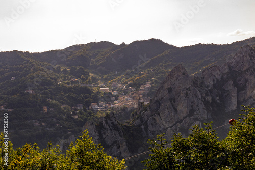 View of Pietrapertosa and Castelmezzano. Two beautiful villages built on the Lucanian Dolomites in Italy. Connected by a zipline that crosses the valley adrenaline-pumping experience. Day and sunset.
