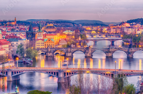 Prague, Czech Republic: romantic bridges that crosses Vltava river in the sunset
