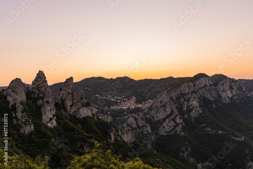 View of Pietrapertosa and Castelmezzano. Two beautiful villages built on the Lucanian Dolomites in Italy. Connected by a zipline that crosses the valley adrenaline-pumping experience. Day and sunset.