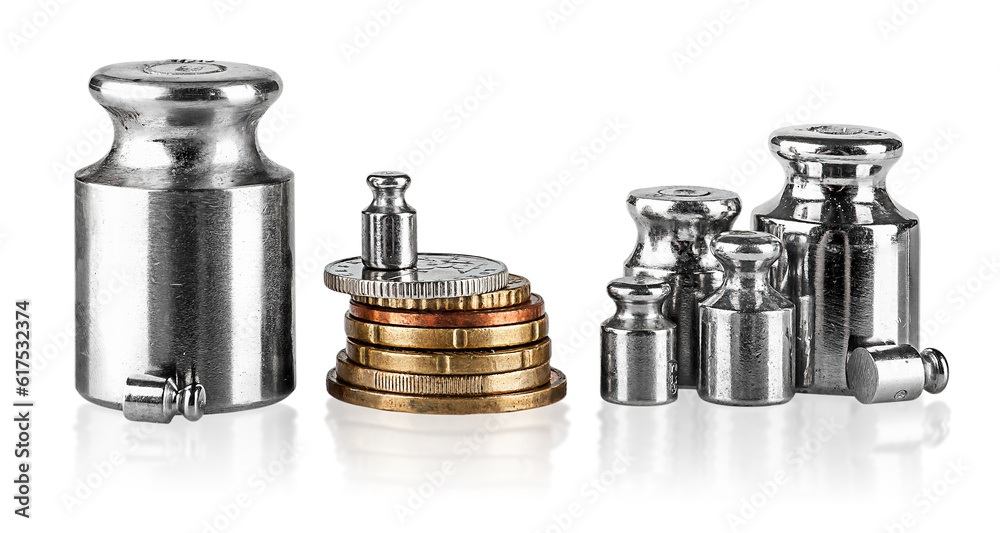Several old scaling weights and coins isolated on white background Several old scaling weights and coins isolated on white background