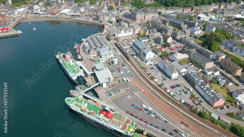 Aerial drone video of the ferry terminal in the coastal town Oban in Scotland