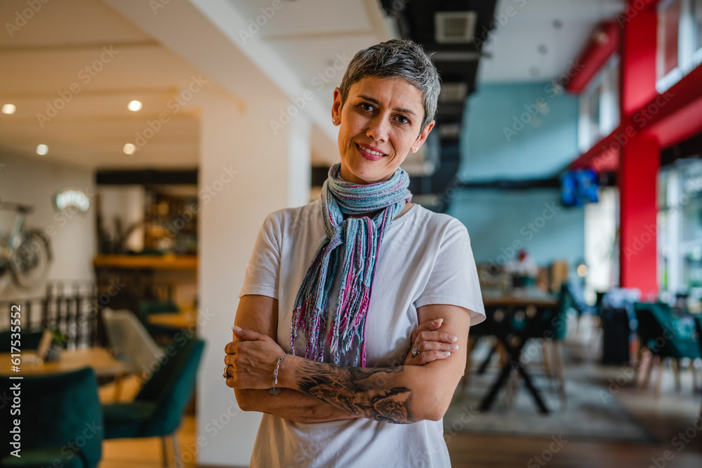 Portrait of woman senior caucasian female stand in cafe happy smile