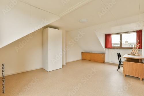 an empty room with red curtains on the window and desk in the room is very clean  but it s no longer than